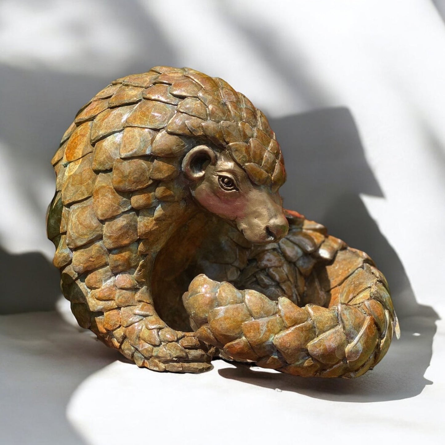 Beautiful bronze pangolin sculpture by artist Roxy Winterburn and available from The Acorn Gallery in Pocklington. Order Online or call us on 01759 307652.
