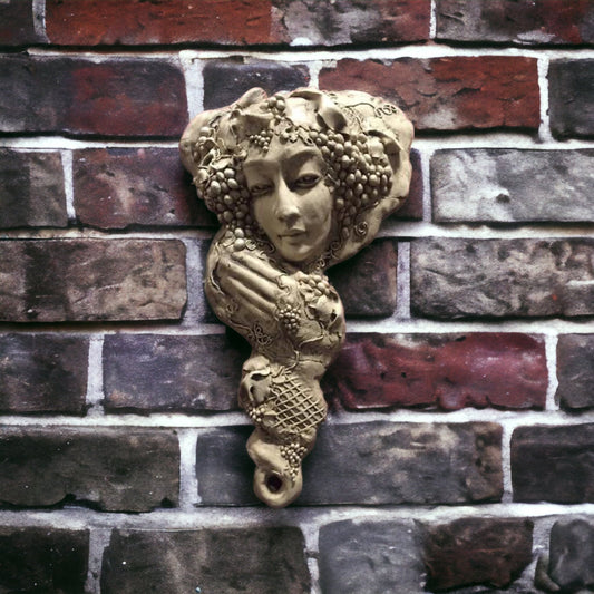 Eve Garden Angel ceramic wall sculpture by Lucinda Brown, 19 x 9 inches, original artwork