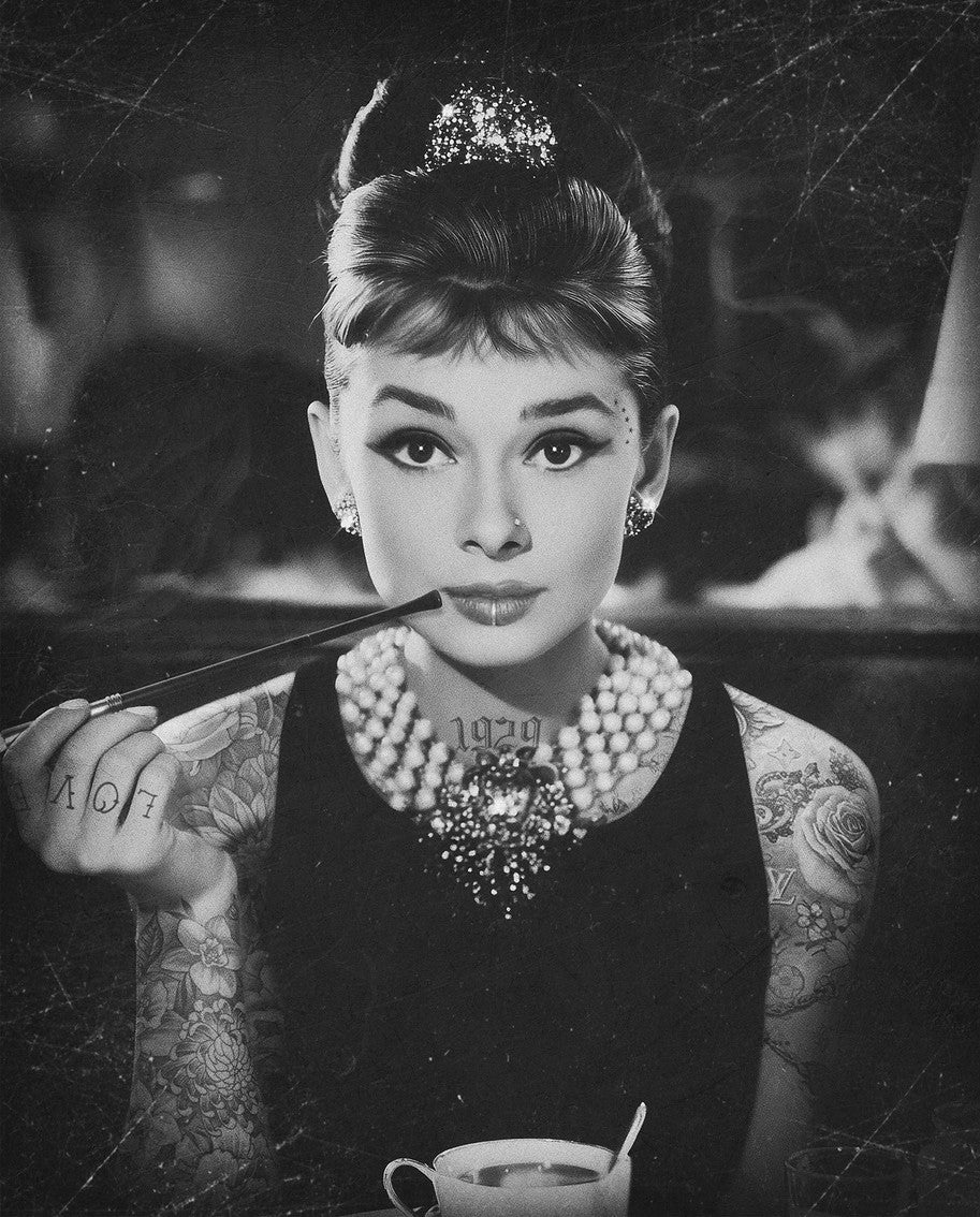 JJ Adams print depicting a black-and-white portrait of a tattooed woman with a pearl necklace and hair ornament, distressed finish