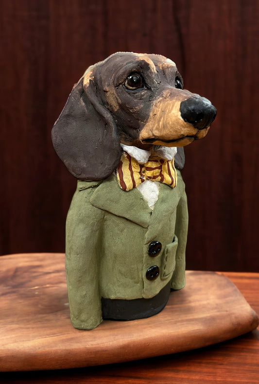 Beautiful hand crafted ceramic dachshund by ceramic artist Louise Brown. Available at The Acorn Gallery in Pocklington. Visit the gallery or shop online or call us on 01759 307652.