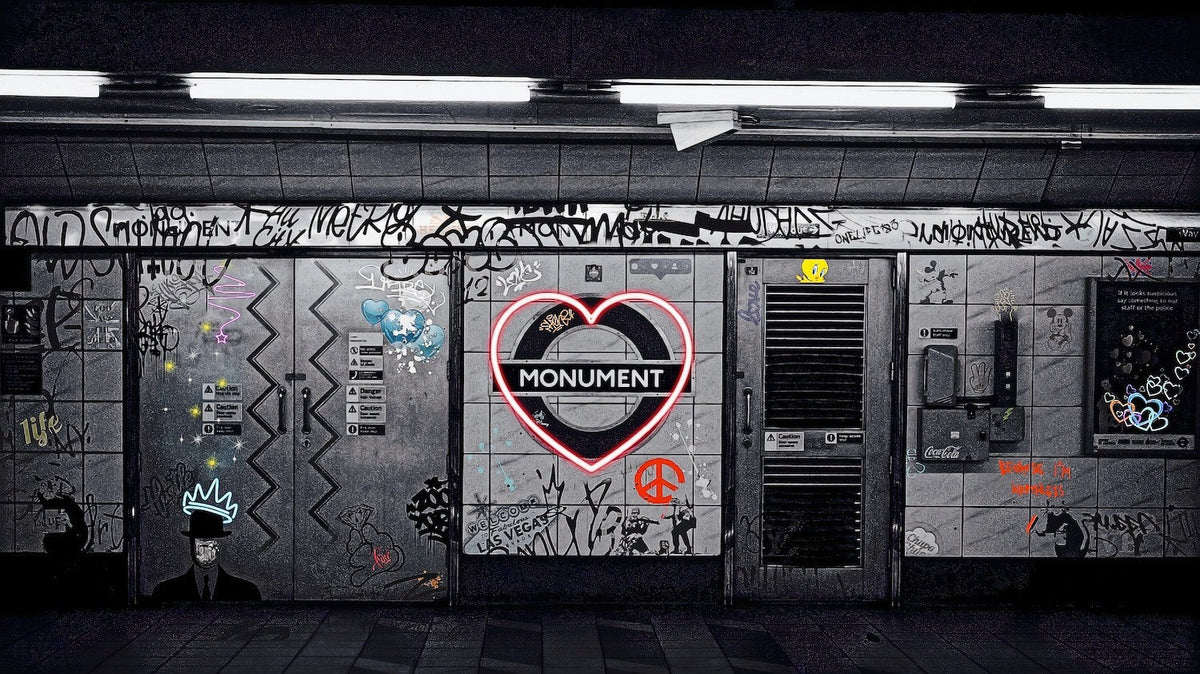 Limited edition graffiti print by Onelife183, featuring a red heart around the word “Monument” amid urban tags and stencils.
