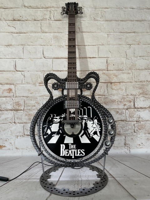 No.6 Abbey Road Beatles-inspired metal epiphone casino guitar sculpture by Paul Southwell with illuminated Abbey Road vinyl design