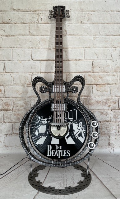 No.6 Abbey Road Beatles-inspired metal epiphone casino guitar sculpture by Paul Southwell with illuminated Abbey Road vinyl design