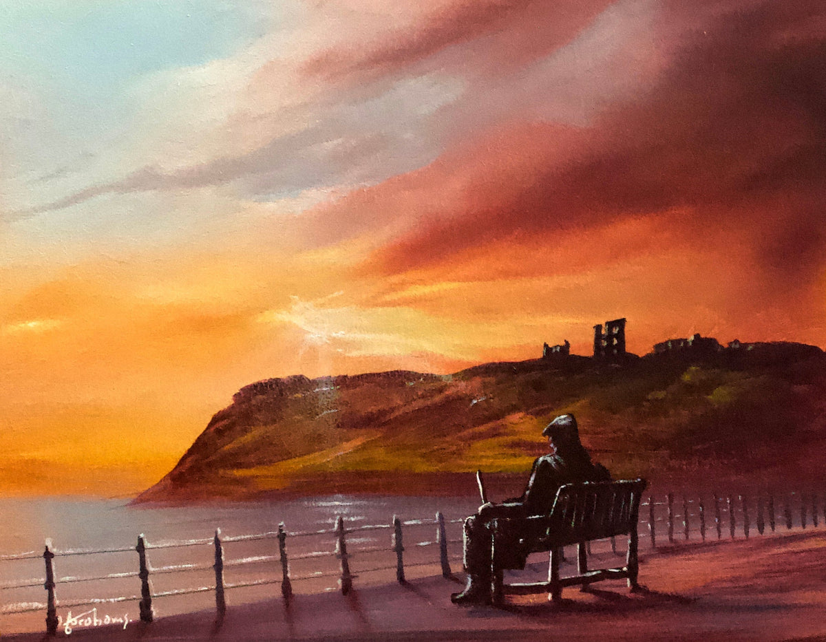 Original oil painting by Danny Abrahams depicting a figure on a bench overlooking the coast beneath a vivid sunset sky.