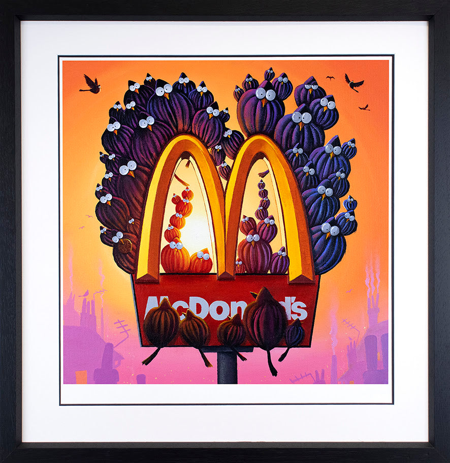 Framed Derrick Fielding giclée print on paper, with an orange and pink McDonald’s scene and bold purple arches.
