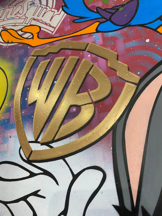 Hue Folk original Looney Tunes jigsaw piece mixed media wall art with gold WB logo and vibrant cartoon characters