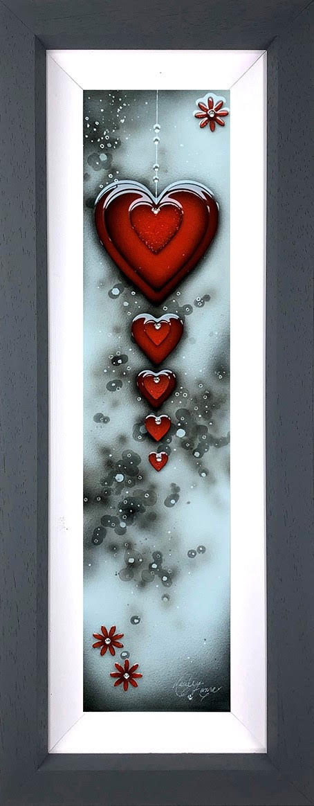 Mixed-media heart artwork in red, white and grey, framed with layered hearts and flower accents; As Love Grows Boutique Original by Kealey Farmer