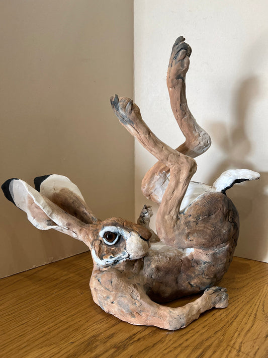 A gorgeous frolicking hare hand made by artist Louise Brown at The Acorn Gallery in Pocklington. Visit us or shop online with safe UK delivery. Or call 01759 307652