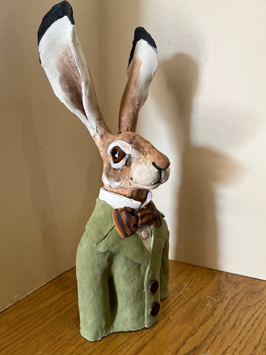 A Louise Brown hare bust with green jacket original sculpture available from The Acorn Gallery, Pocklington. Shop online with safe UK delivery. Or call 01759 307652.