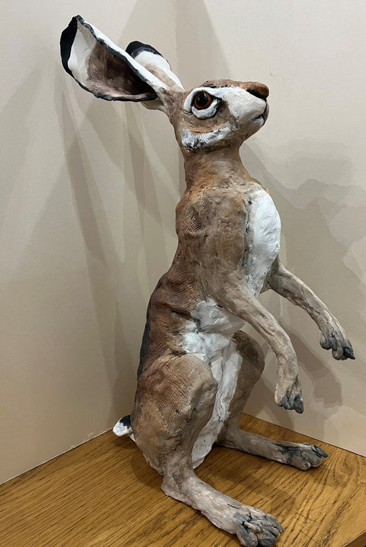A beautiful tall ceramic hare hand crafted by artist Louise Brown at The Acorn Gallery in Pocklington. Visit us or shop online with safe UK delivery. Or call 01759 307652