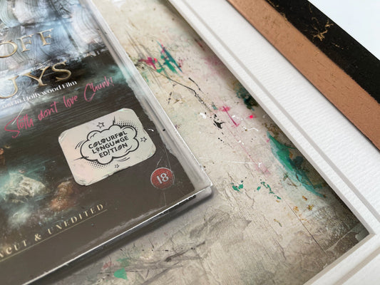 Close-up of limited edition framed print titled F*ck Off You Guuuys The Goonies Colourful Language Edition by Mark Davies with signature and certificate