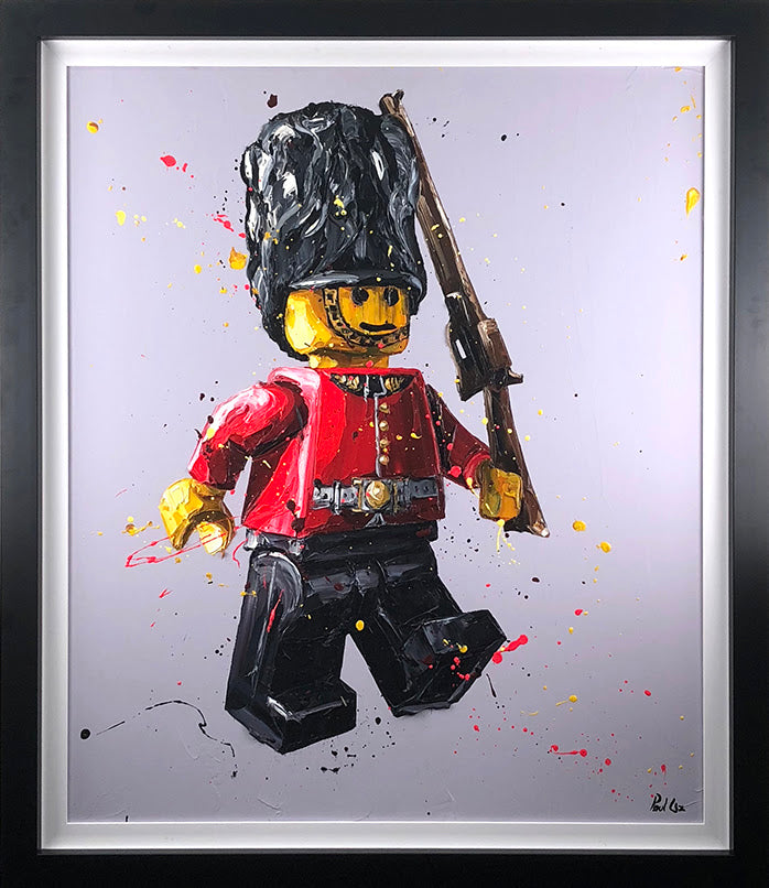 Canvas print by Paul Oz featuring a hand-embellished Lego soldier in a red uniform and bearskin hat, with a rifle.