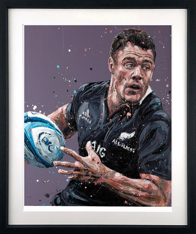 Limited edition paper print by Paul Oz, depicting a rugby player in a black jersey holding a blue-and-white ball amid colorful splatters.