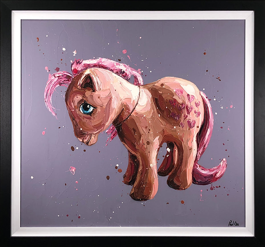 Hand-embellished canvas by Paul Oz depicting a peach-colored pony with a pink mane and tail against a speckled grey-purple background.