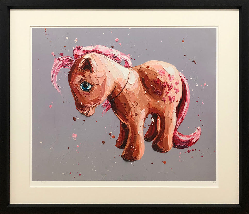 Limited edition Peaches My Little Pony print by Paul Oz, featuring a pink and peach pony with a blue eye on grey paper.