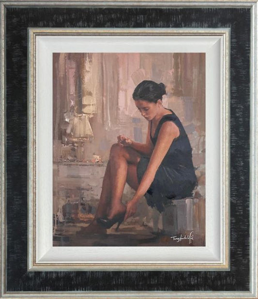 Timeless Beauty by Tony Hinchliffe, a beautiful limited edition canvas print of a young woman with dark hair wearing a black dress reaching down to put on her shoe. Available from The Acorn Gallery in Pocklington. Order online or call us on 01759 307652.