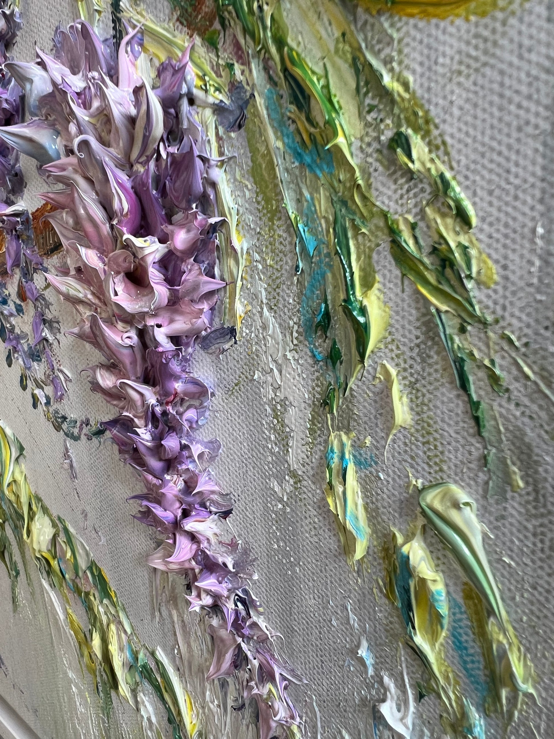 Original textured painting of delicate lilac Wisteria blossoms against a soft background with vibrant greenery, created with expressive impasto brushwork by Yulia Lisle. Painting available from The Acorn Gallery in Pocklington. Visit us or Shop online or Call 01759 307652. 