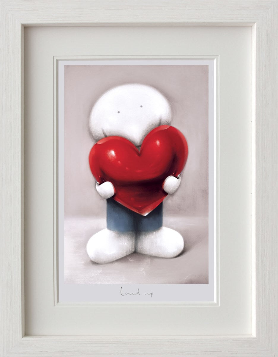 Loved Up framed print by Doug Hyde showing a person holding a big red heart ready to fill your world with love. Available now at The Acorn Gallery in Pocklington with secure delivery across the UK. Visit us or shop online or call us on 01759 307652.