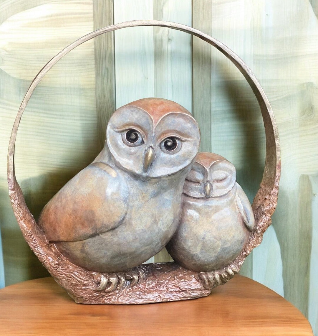 A fabulous owl sculpture of parent and child owls huddled together in a bronze circle. By Yorkshire artist Roxy Winterburn. Cute As Buttons Bronze Sculpture. Small edition size. FREE UK Delivery. Visit Us or Order Online.