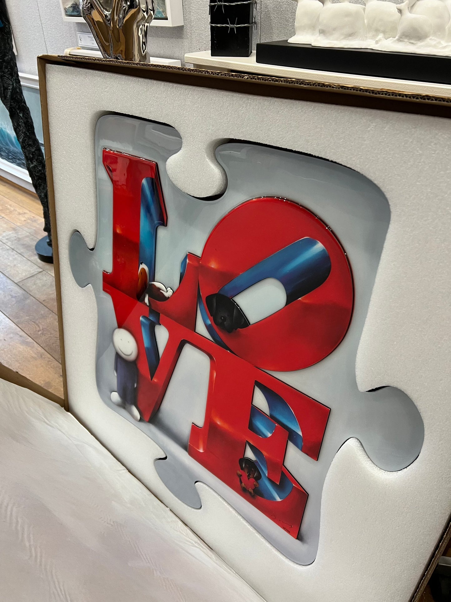 This brilliant jigsaw shaped artwork featuring the word 'Love' is titled Piece of Love by Doug Hyde it is available at The Acorn Gallery in Pocklington with secure delivery across the UK. Visit us or shop online or call us on 01759 307652.