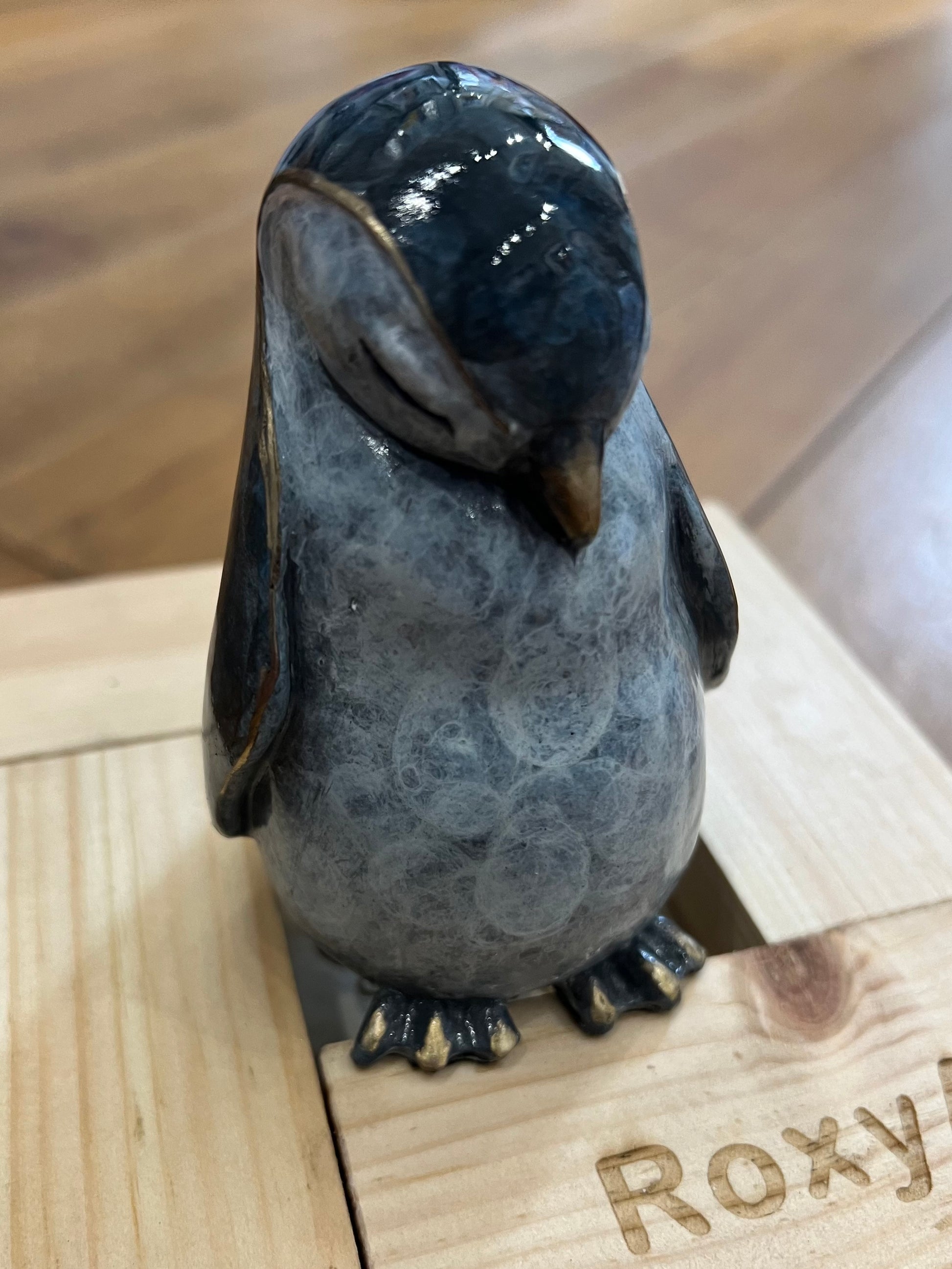 Bronze baby penguin sculpture by Yorkshire artist Roxy Winterburn, available from The Acorn Gallery in Pocklington. Order online or call us on 01759 307652. Free U.K. Delivery