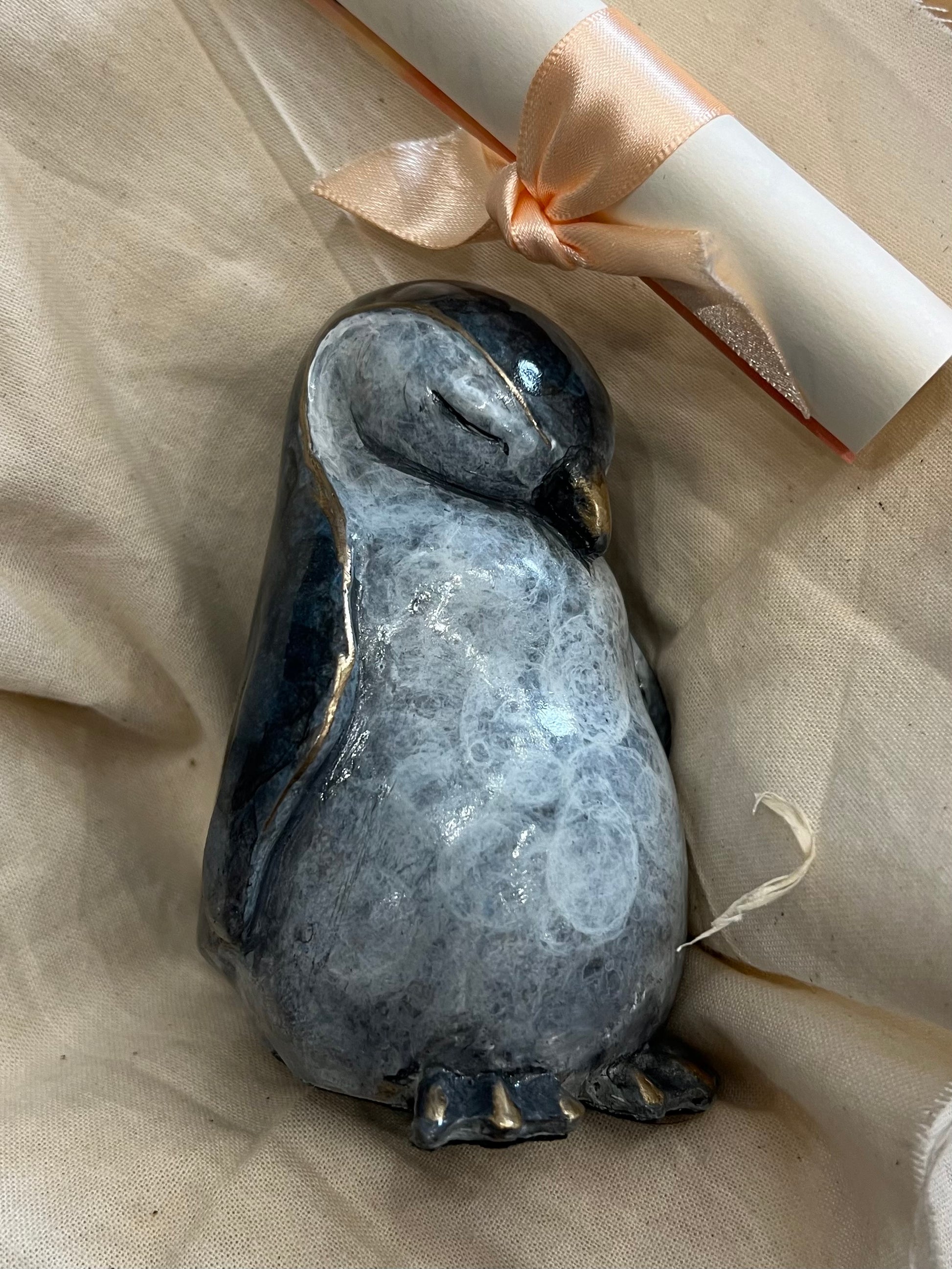 Bronze baby penguin sculpture by Yorkshire artist Roxy Winterburn, available from The Acorn Gallery in Pocklington. Order online or call us on 01759 307652. Free U.K. Delivery