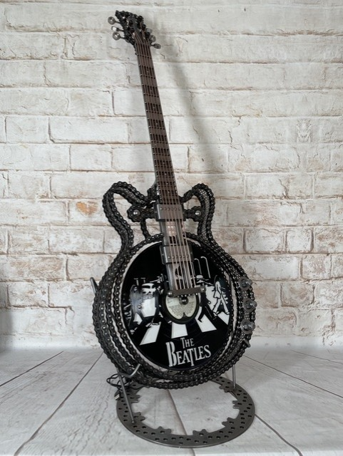 No.6 Abbey Road Beatles-inspired metal epiphone casino guitar sculpture by Paul Southwell with illuminated Abbey Road vinyl design