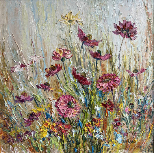 Original textured oil painting of a colourful summer wildflower meadow with pink, purple and yellow blooms, created with expressive impasto palette knife techniques by Yulia Lisle.