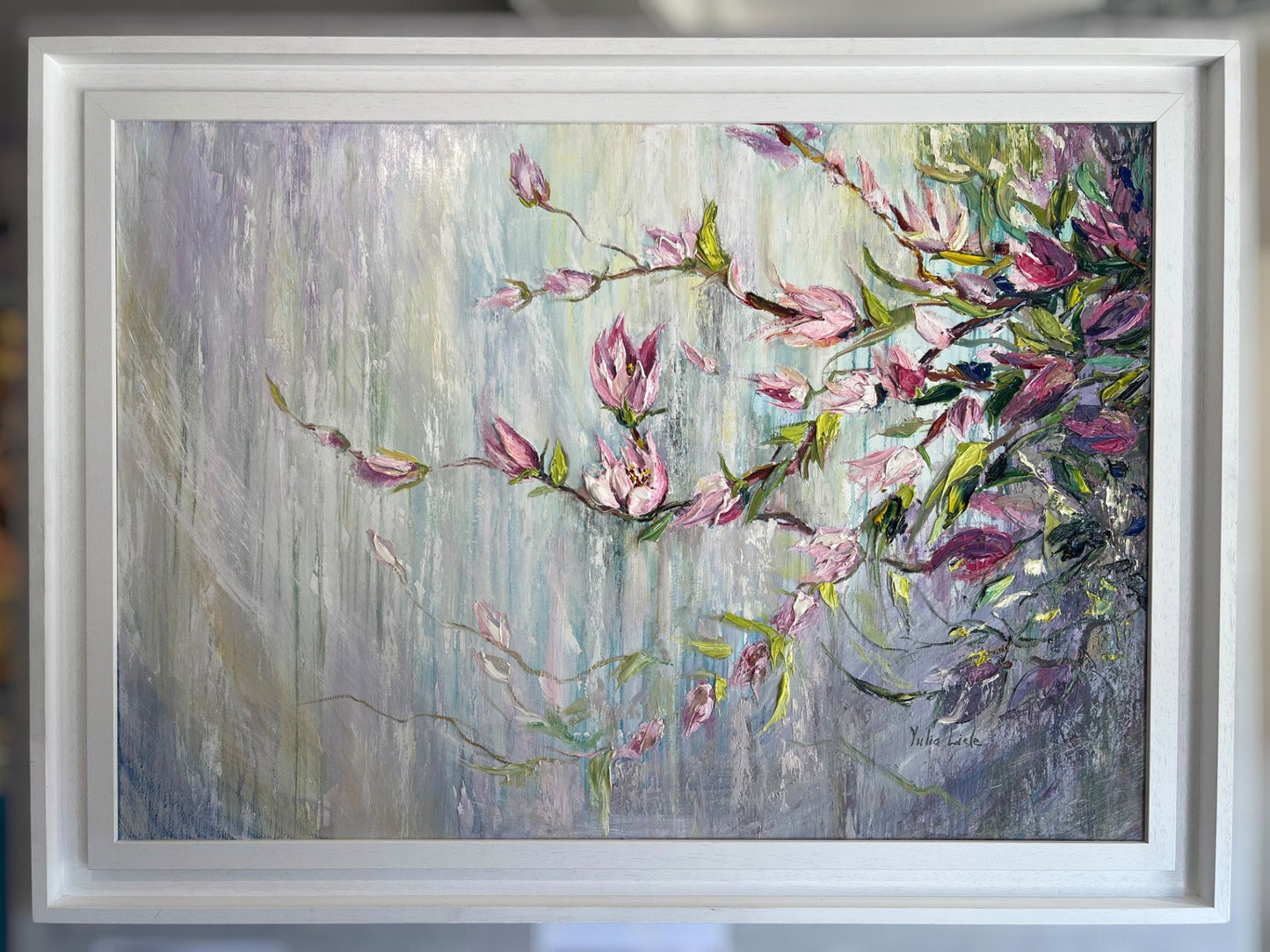 Original textured painting of delicate pink magnolia blossoms against a soft pastel blue and lavender background, created with expressive impasto brushwork by Yulia Lisle.
