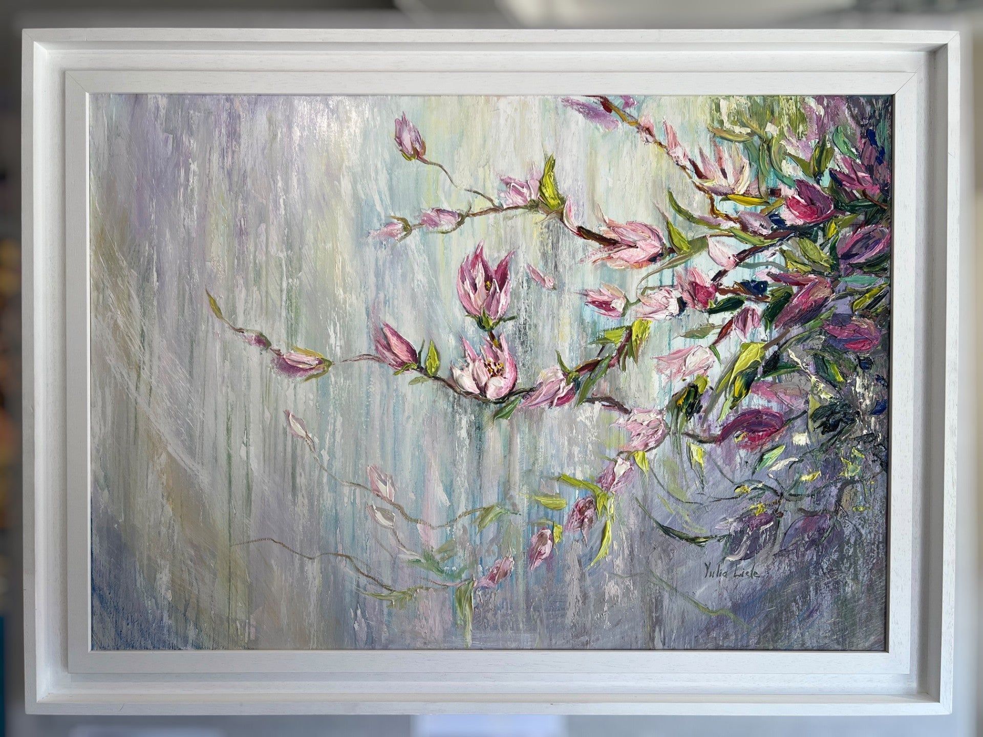 Original textured painting of delicate pink magnolia blossoms against a soft pastel blue and lavender background, created with expressive impasto brushwork by Yulia Lisle.