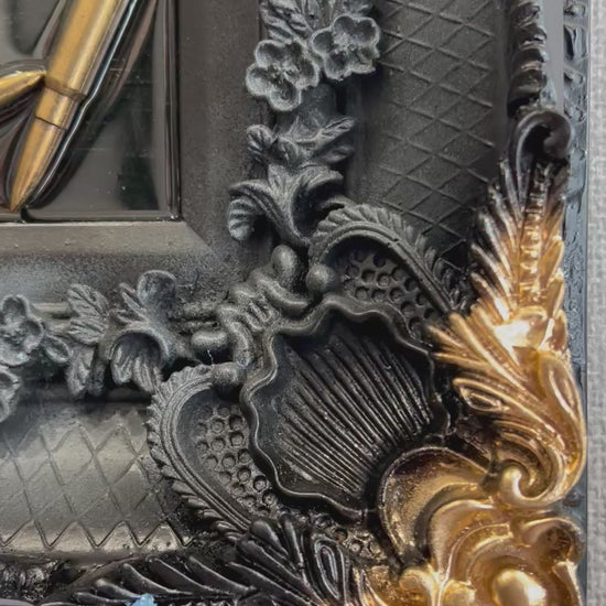 Video of Artwork by Ghost featuring the Peaky Blinders character Tommy Shelby. It is titled Strike When Your Enemy Is Weak, and comes in a stunning black and gold ornate frame, embellished with shell casings! Shop at The Acorn Gallery, Pocklington. Buy online or call 01759 307652.