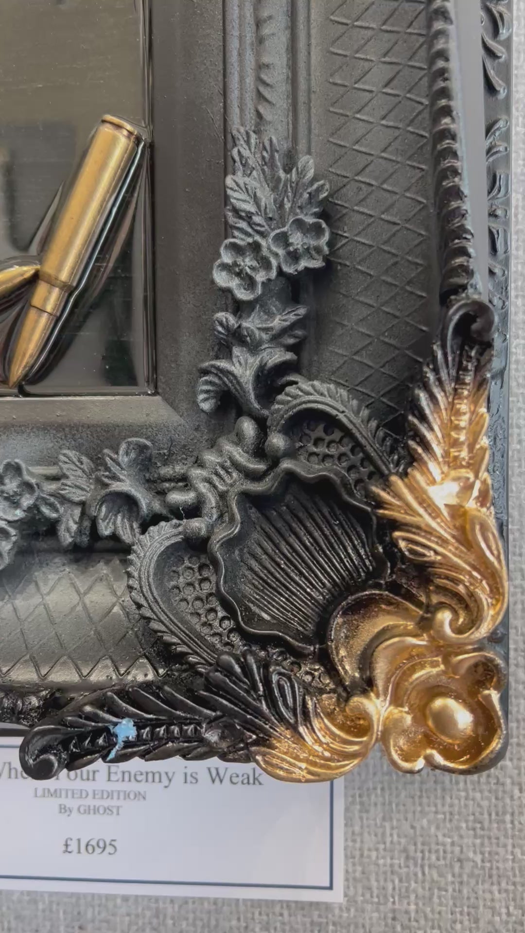 Video of Artwork by Ghost featuring the Peaky Blinders character Tommy Shelby. It is titled Strike When Your Enemy Is Weak, and comes in a stunning black and gold ornate frame, embellished with shell casings! Shop at The Acorn Gallery, Pocklington. Buy online or call 01759 307652.