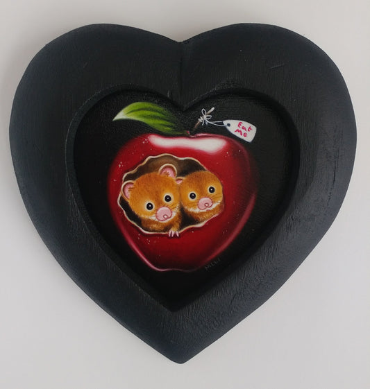 Original oil painting by Marie Louise Wrightson on a black heart-shaped board, featuring a red apple with two mice.