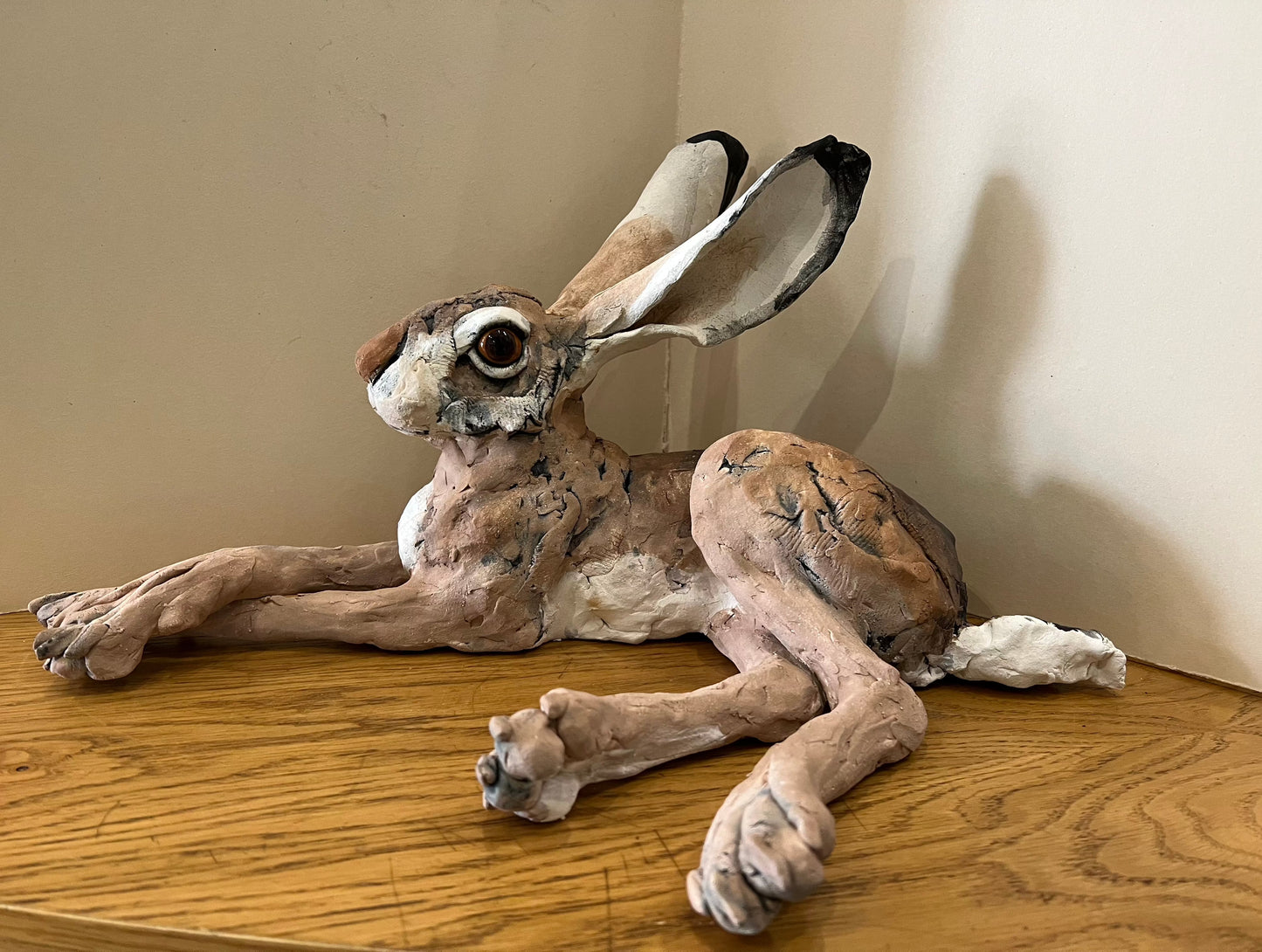 Original Hare Sculpture by Louise Brown. Beautiful hand made ceramic hare with a gorgeous lifelike glaze on the eyes. Visit Us or Shop Online. Secure UK Delivery. Call 01759 307652.