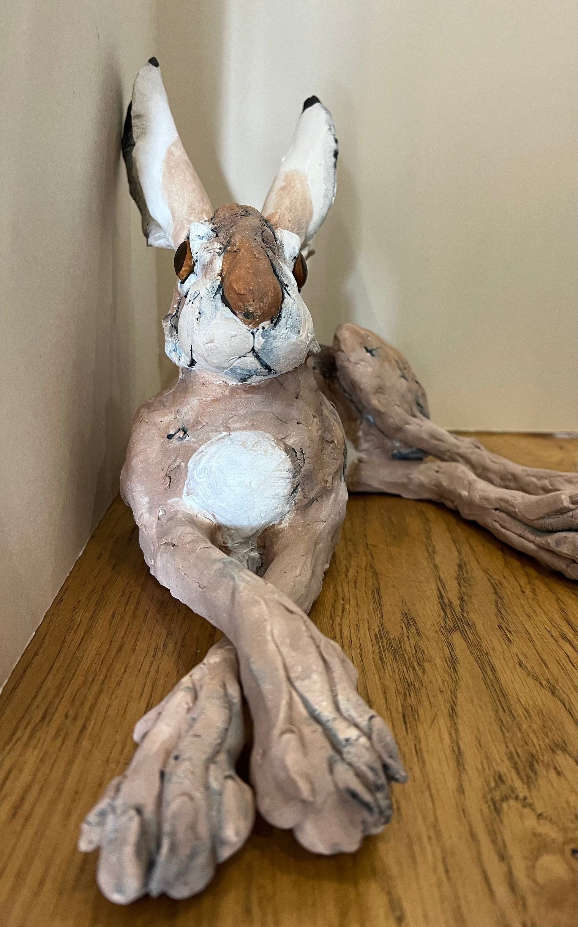 Original Hare Sculpture by Louise Brown. Beautiful hand made ceramic hare with a gorgeous lifelike glaze on the eyes. Visit Us or Shop Online. Secure UK Delivery. Call 01759 307652.